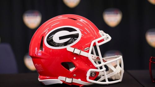 The football helmet of Georgia is shown before the head coaches' joint news conference at the Le Meridien Dania Beach Hotel, on Dec., 29, 2023, in Fort Lauderdale, Florida. (Jason Getz/The Atlanta Journal-Constitution/TNS)