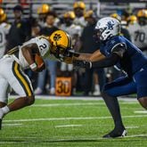 Valdosta’s Todd Robinson is taken down by his facemask during the game against South Gwinnett on September 13, 2024. Valdosta won 27-14. (Jamie Spaar for the Atlanta Journal Constitution)