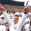 Texas head coach Steve Sarkisian celebrates after in beating Michigan 31-12 in an NCAA college football game in Ann Arbor, Mich., Saturday, Sept. 7, 2024. (AP Photo/Paul Sancya)