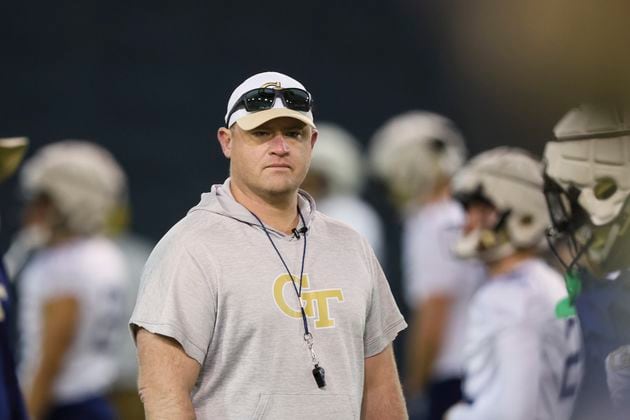 Georgia Tech coach Brent Key watches warm-ups during their first day of spring football practice at the Brock Indoor Practice Facility, Monday, March 11, 2024, in Atlanta. (Jason Getz / jason.getz@ajc.com)