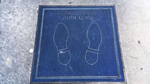 John Lewis's literal footprints are included in the display at the National Park Service’s Martin Luther King Jr. National Historic Site. The honor was created by Xernona Clayton in 2004 and includes such notable leaders as Maya Angelou, Hank Aaron and Bill Clinton. (Pete Corson / pcorson@ajc.com)