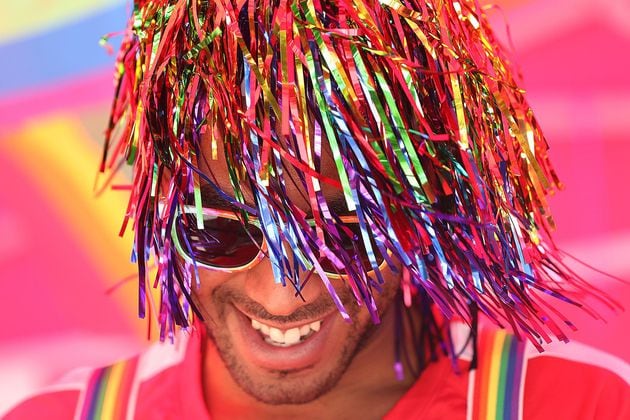 Christian Goodlette sports Pride hair during the Pure Heat Community Festival at Piedmont Park, the signature event of Black Pride Weekend. Photo: Curtis Compton/ccompton@ajc.com