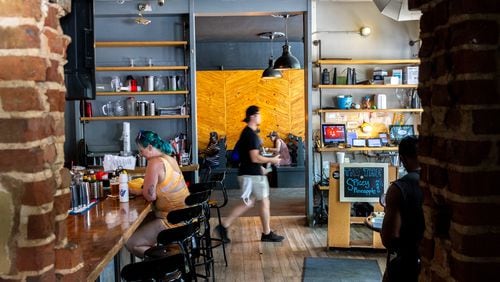 Customers dine at Dakota Blue in Atlanta on Wednesday, July 10, 2024. (Arvin Temkar / AJC)