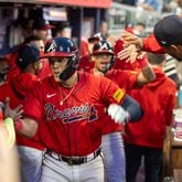 Atlanta Braves third baseman Gio Urshela (9) celebrates after hitting a homer in the second inning against the Los Angeles Dodgers at Truist Park in Atlanta on Friday, September 13, 2024. The Braves won 6-2. (Arvin Temkar / AJC)