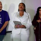 U.S. Rep. Cori Bush, center, waits to be introduced to supporters on Tuesday, Aug. 6, 2024, before acknowledging her defeat at a watch party at Chevre Events in downtown St. Louis. (Christian Gooden/St. Louis Post-Dispatch via AP)