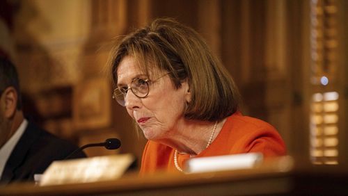 Dr. Janice Johnston, a member of the Georgia State Election Board, speaks during a meeting at the State Capitol in Atlanta, Tuesday, Aug. 6, 2024. (Matthew Pearson/WABE via AP)