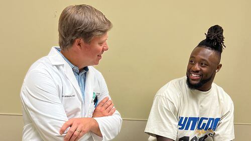 Dr. Cliff Willimon and current Arizona Cardinal Owen Pappoe had a surprise meeting this summer at Children's Healthcare of Atlanta. (Photo Courtesy of Children's Healthcare of Atlanta)