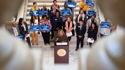 Rep. Lucy McBath calls for Gov. Brian Kemp to remove three members of the State Election Board during a press conference at the Capitol in Atlanta on Monday, Aug. 26, 2024. (Ben Gray / Ben@BenGray.com)