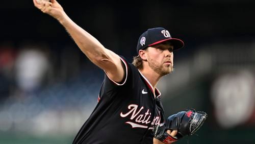 Washington Nationals starting pitcher Jake Irvin throws during the second inning of a baseball game against the Atlanta Braves, Wednesday, Sept. 11, 2024, in Washington. (AP Photo/John McDonnell)