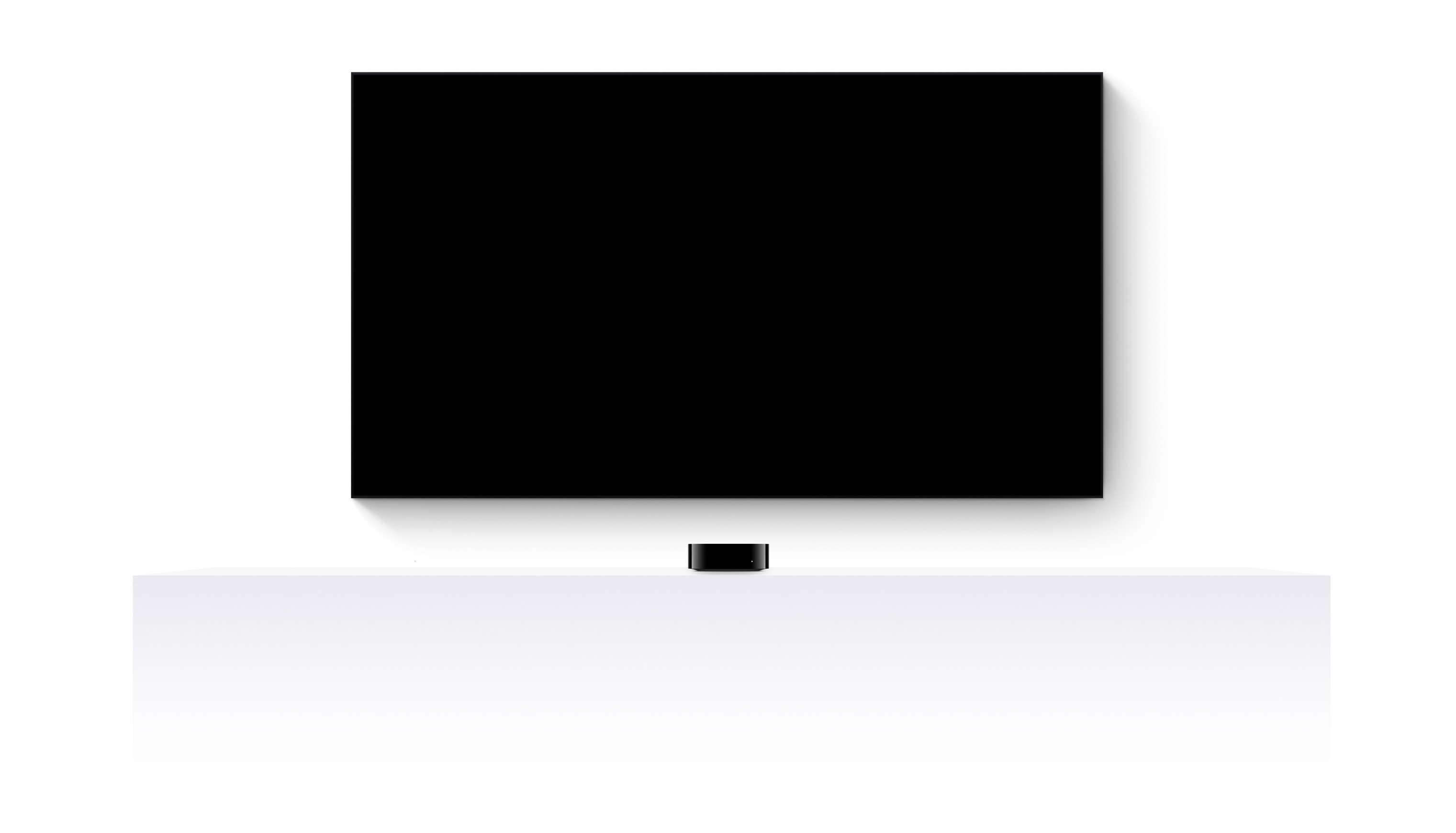 Un Apple TV 4K y un televisor de pantalla plana muestran un tráiler editado de varias películas y series de Apple TV+