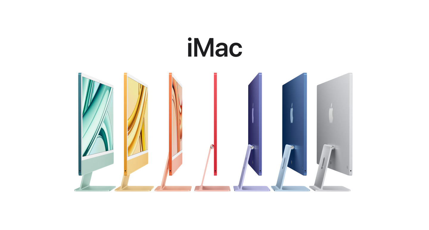 iMac 24 inci dalam warna hijau, kuning, oranye, pink, ungu, biru, dan perak, berdiri sebaris, menampilkan logo Apple di bagian belakang layar