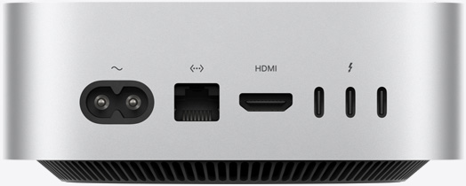 Gümüş rengi Mac mini’nin arka bağlantı noktalarını gösteren  arkadan görünümü: bir adet güç bağlantı noktası, bir adet Ethernet bağlantı noktası, bir adet HDMI bağlantı noktası ve üç adet Thunderbolt bağlantı noktası