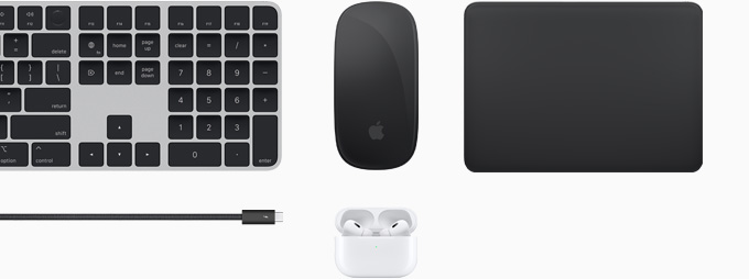 Kollektion an Zubehör mit Magic Keyboard, Magic Mouse, Magic Trackpad, Thunderbolt 4 Pro Kabel und AirPods Pro.