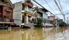 Flash flood sweeps away hamlet as Vietnam storm toll rises to 141 dead