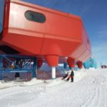 A airplane that is covered in snow