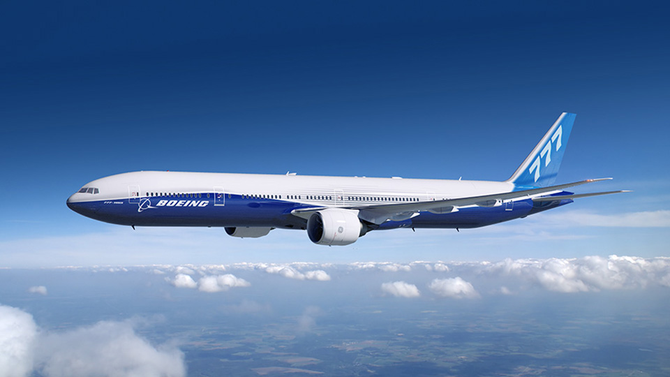 Picture of Boeing 7 7 7 in flight.