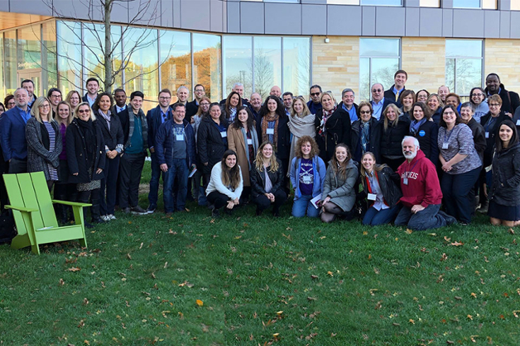 the BUAA alumni board poses outside skyline residence hall