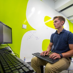 Student working on drone