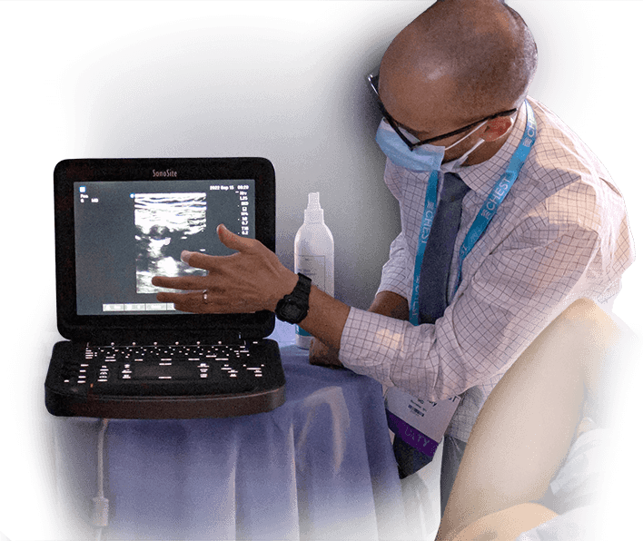 An instructor demonstrates ultrasonography at a CHEST simulation course