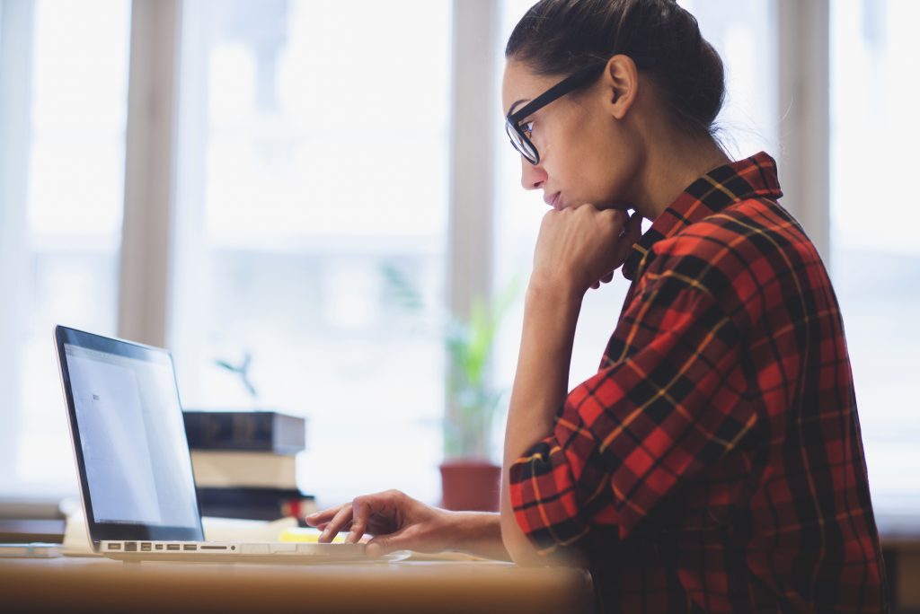 Young woman working on laptop