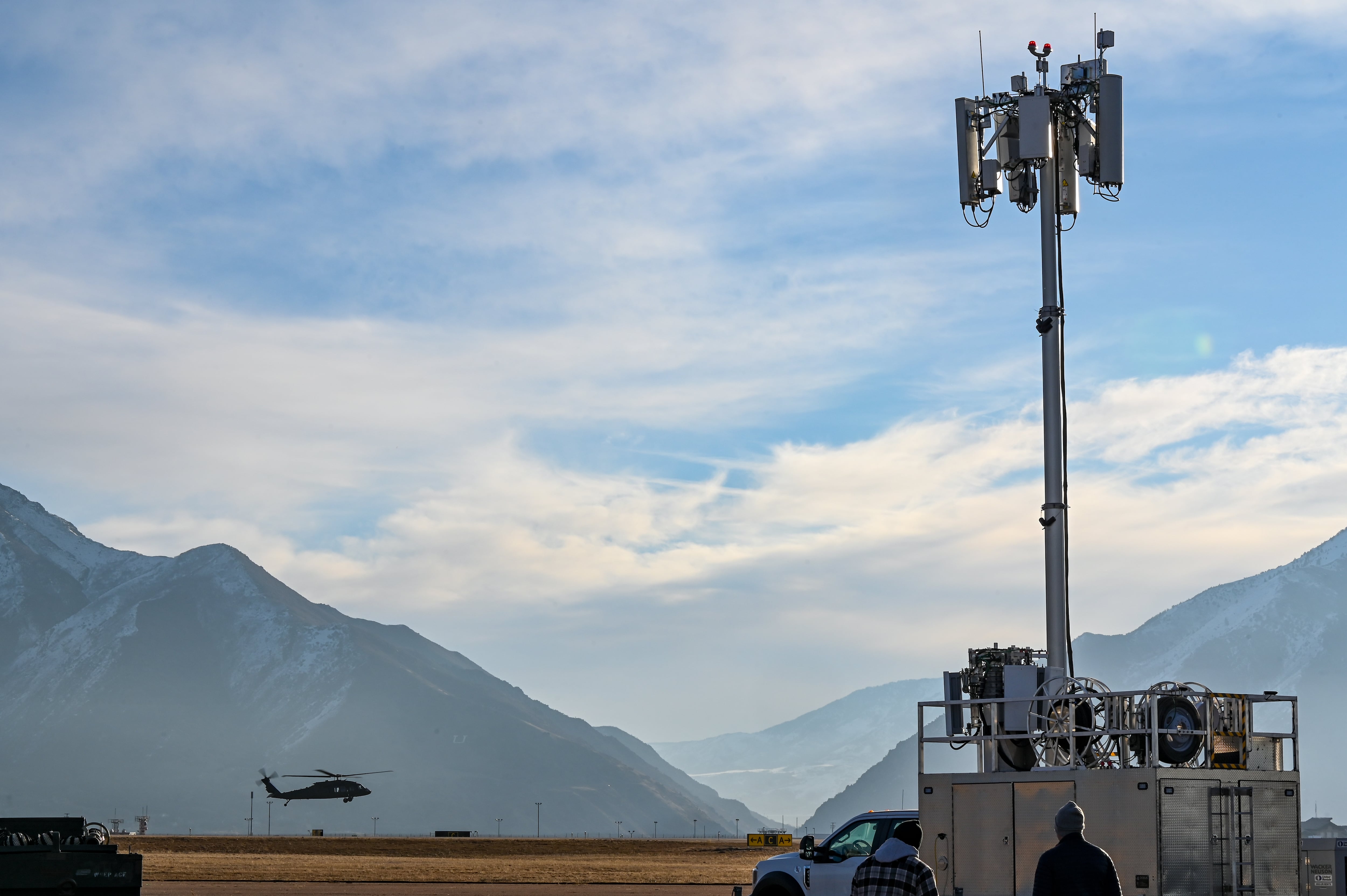 A UH-60 Black Hawk passes over the runway during a series of 5G avionics tests March 2, 2022, at Hill Air Force Base, Utah.