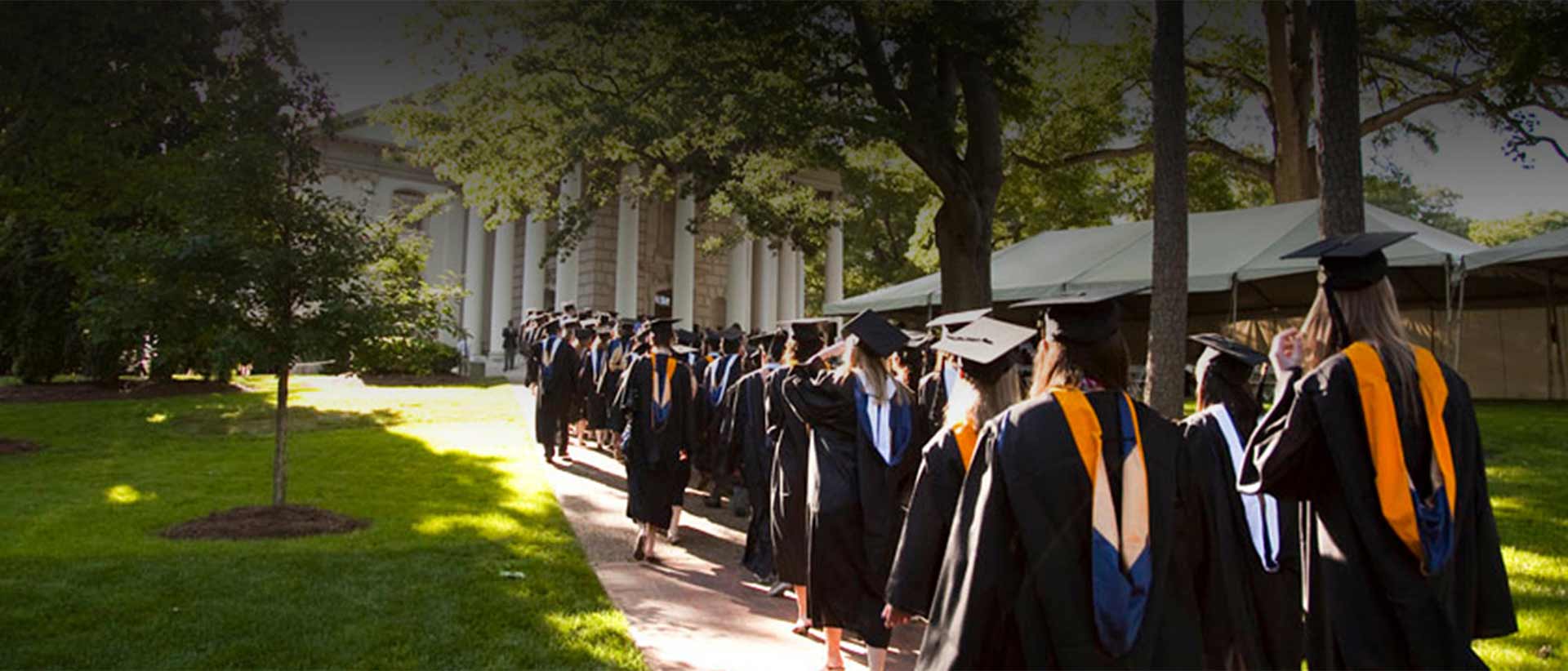 graduates lined up to walk to ceremony in Glenn Auditorium