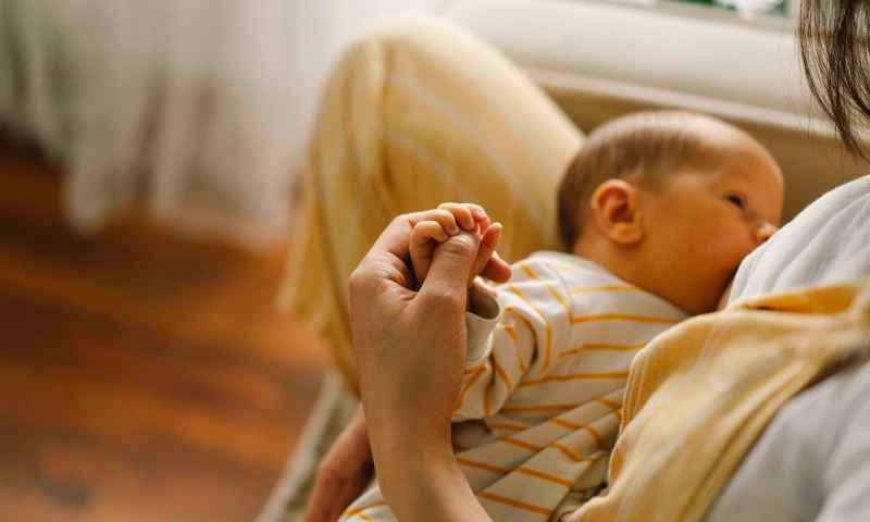 Woman breastfeeding her baby.