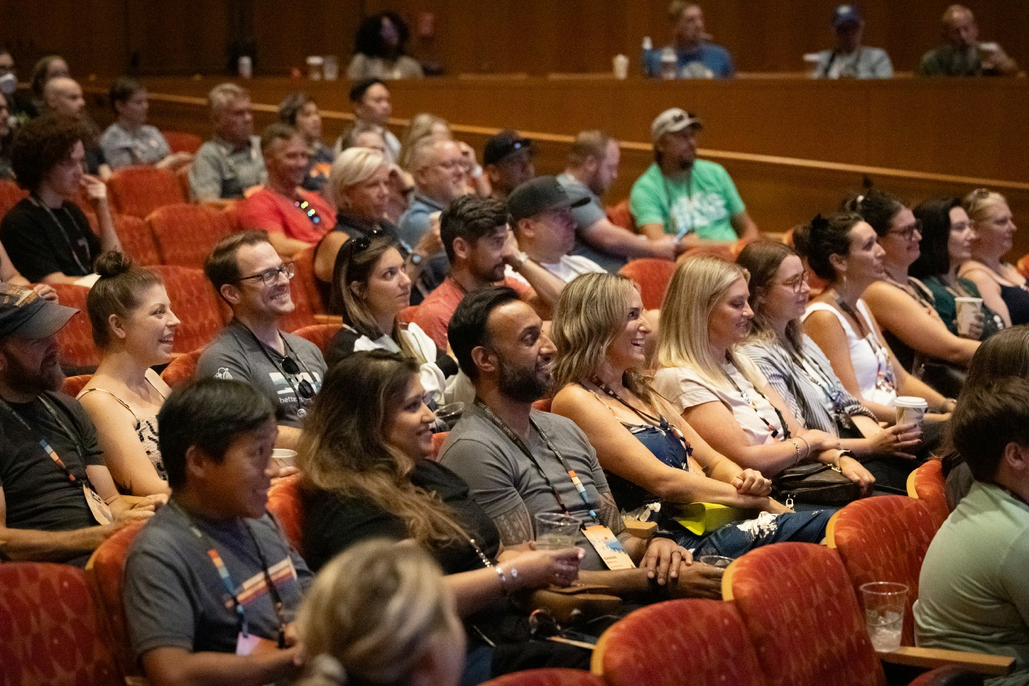 Employees watching presentations at our annual retreat.