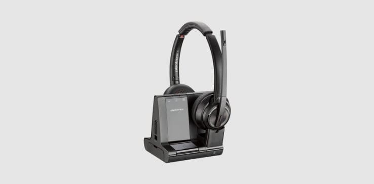 Poly Savi 8220 Office series DECT wireless headset on base stand