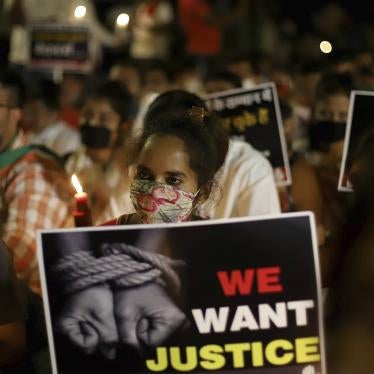 Activists protest against gender-based violence, in Delhi, India.