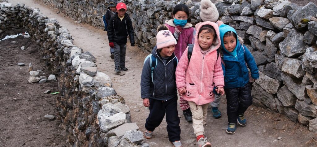 kids going to school smiling