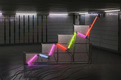 A graph made of neon tubes in a room