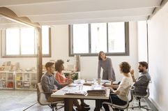 Business people talking in a modern boardroom