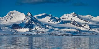 The Southern Ocean and snow-covered landscape of Antarctica.