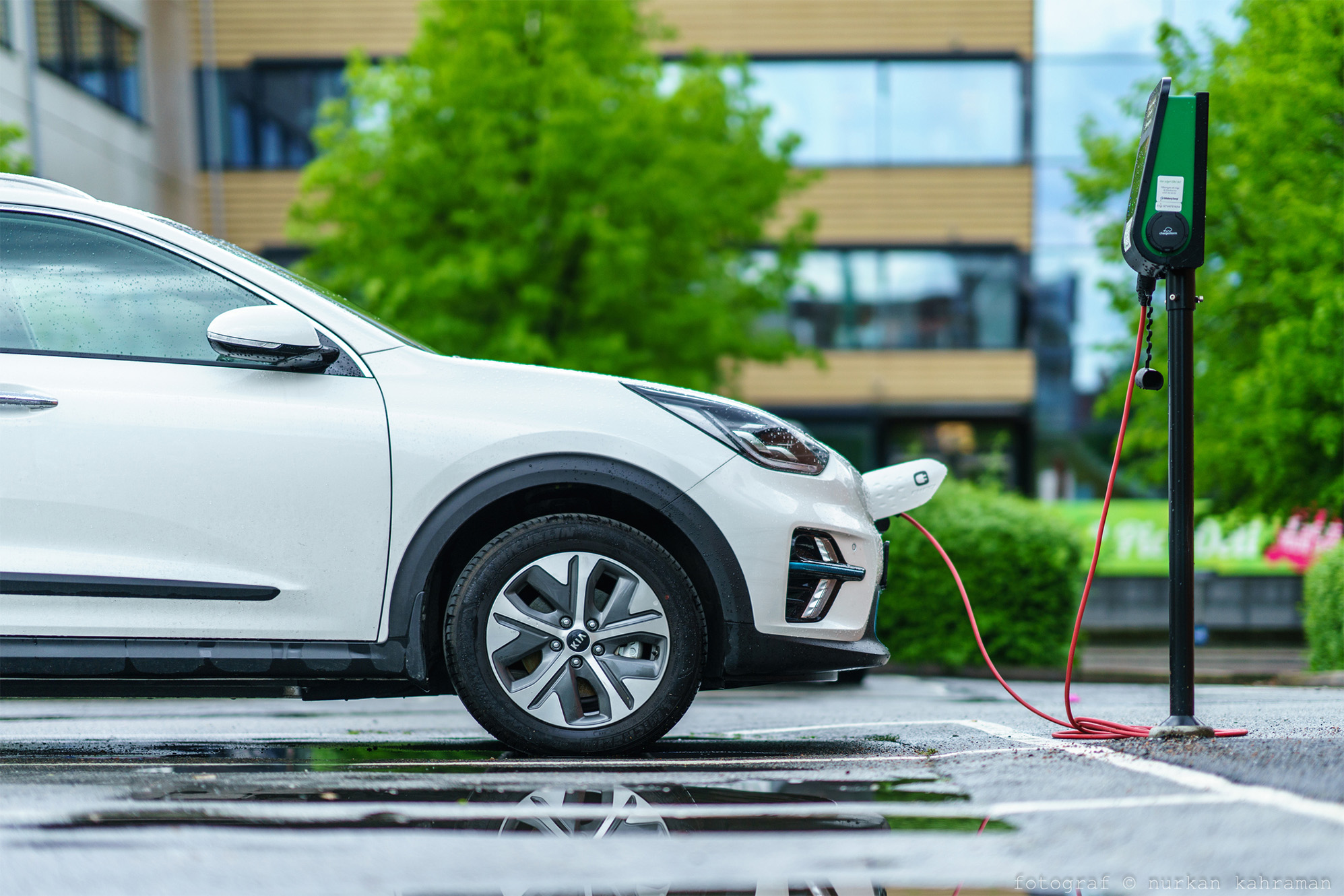 KIA NIRO electric car is charging on street parking lot of Lindholmen, Gothenburg.