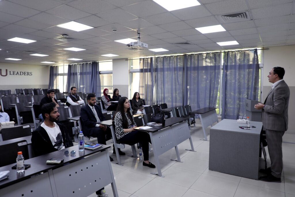 Students from the Faculty of Law at Middle East University interview the national security expert, Dr. Al-Nuaimat.