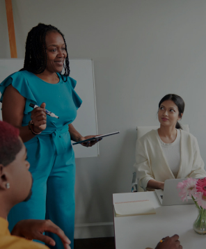 Students being coached by a mentor