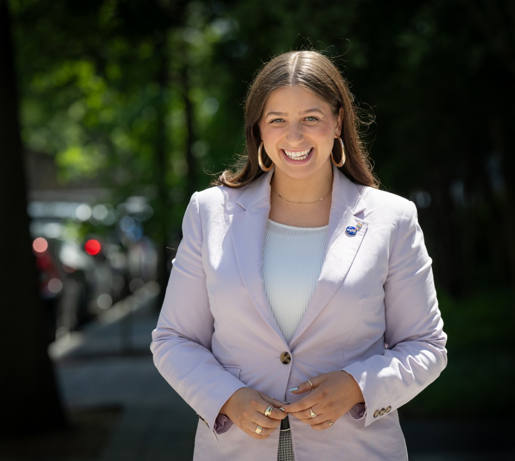 NASA Management and Program Analyst Mallory Carbon, poses for a portrait, Wednesday, May 29, 2024, outside the NASA Headquarters Mary W. Jackson Building in Washington. Photo Credit: (NASA/Bill Ingalls)