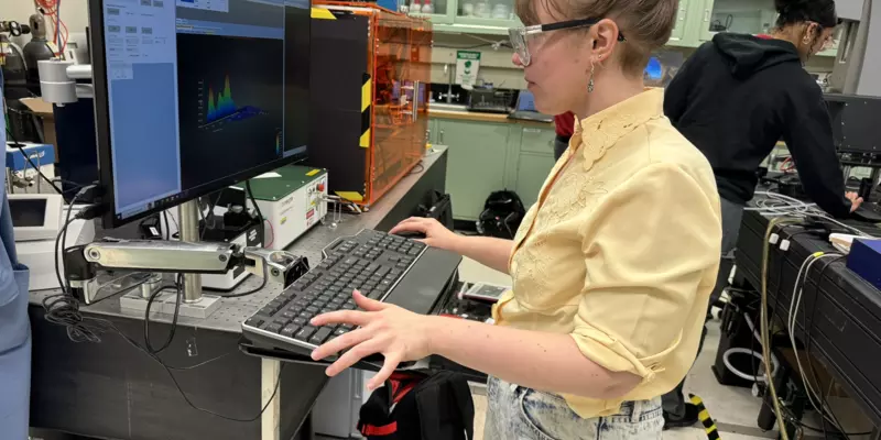 Julie Rieland, a researcher, looks at data on her computer screen in her lab.