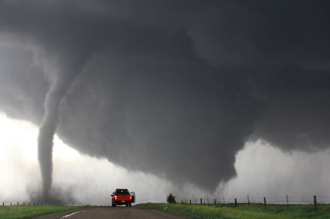 Tornado Nightmares - A satellite tornado circulates around a newly formedtornado as we crest a hill