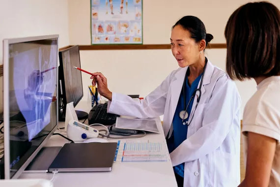 Doctor explaining a scan to their patient