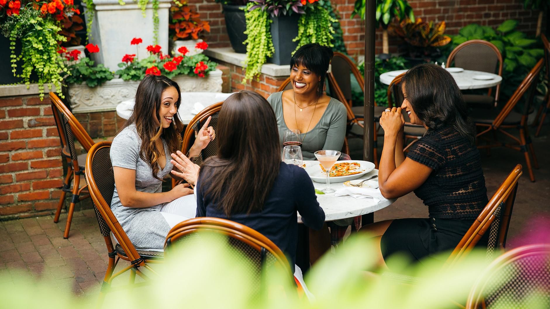 Group of four eating at resturant