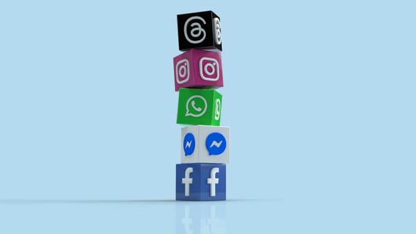 Meta app icons represented as blocks stacked on top of one another, with Facebook at the bottom and Messenger on top