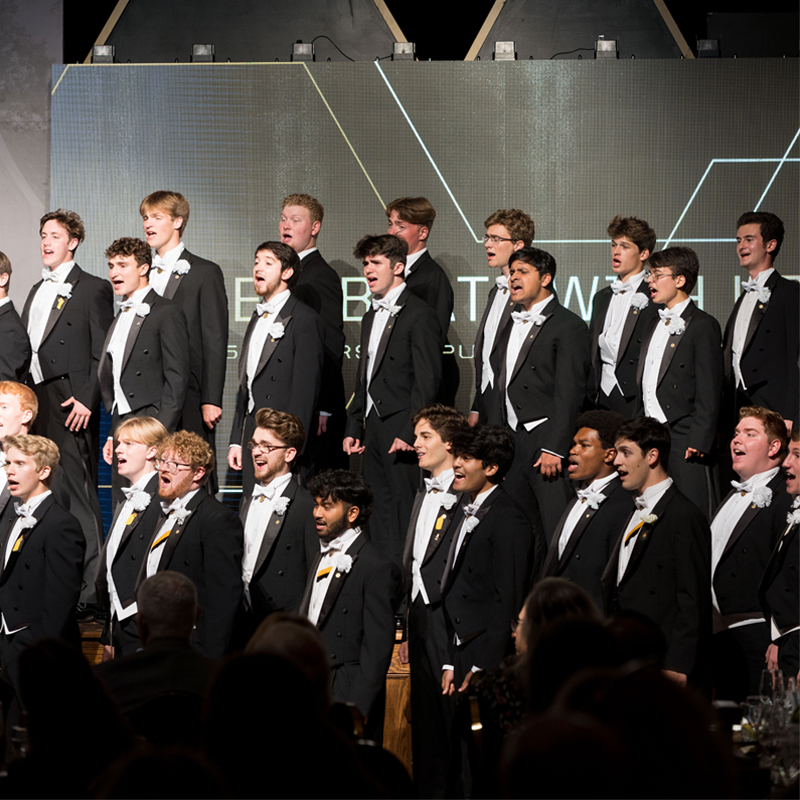 A photo of the Glee club singing for Purdue Celebrating 150 years of engineering 