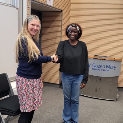 Zimpi Helen Kono is awarded a prize by Head of School, Prof Hazel Screen