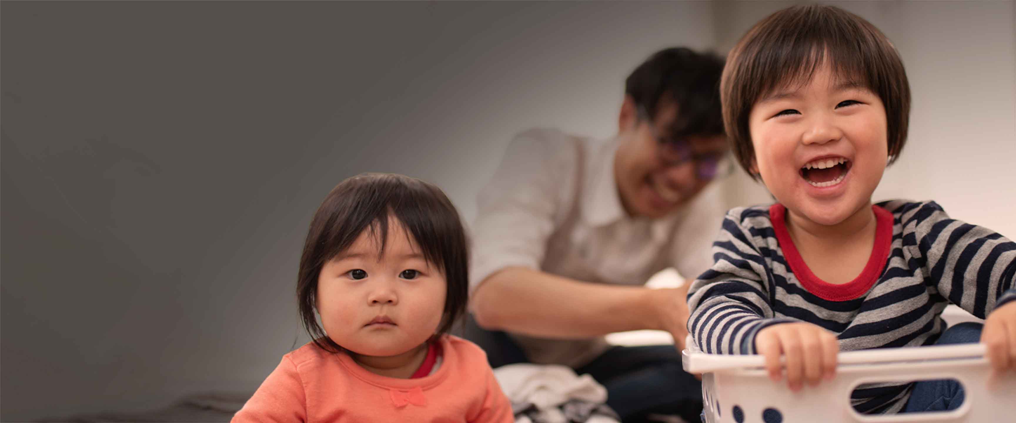 Family doing laundry together.