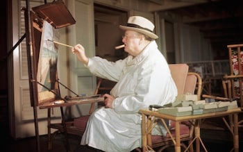 Winston Churchill engrossed in an oil painting at Miami Beach, Florida