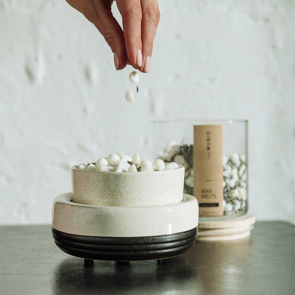 Lavender soy wax melts in a glass votive