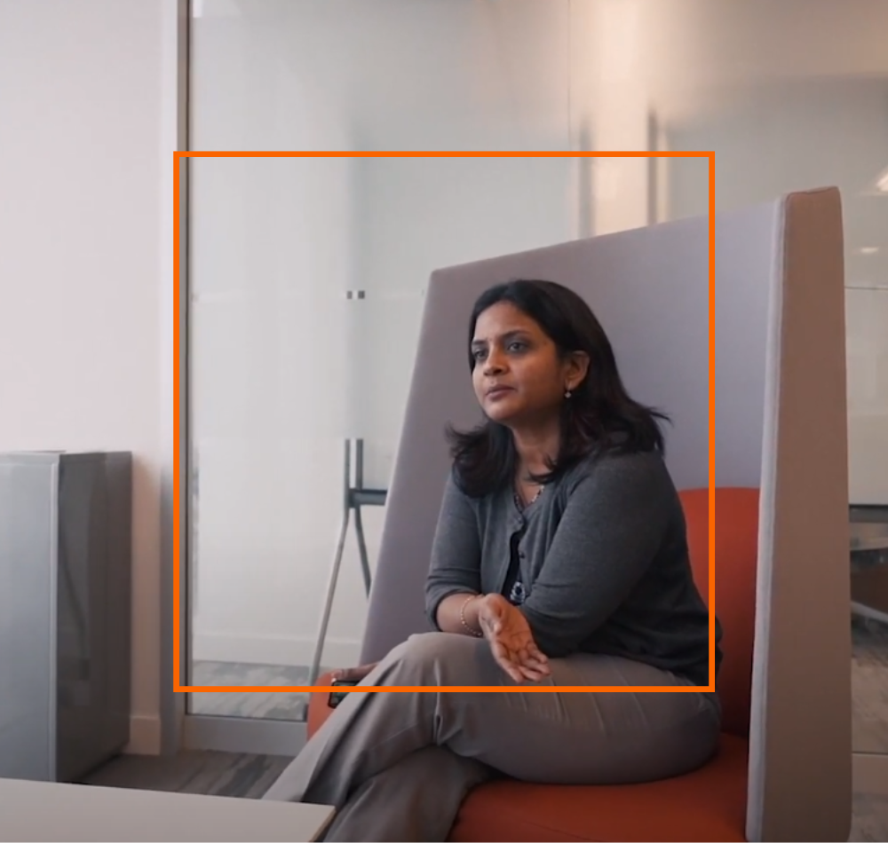 A woman professional sitting on chair