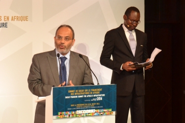 UNECA Executive Secretary Dr Carlos Lopez. In the background is moderator of the Summit, Amadou Mahtar Ba